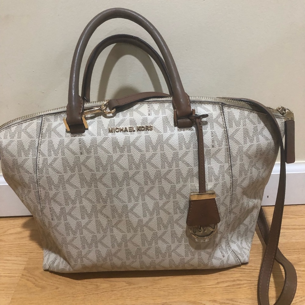 Michael Kors handbag with shoulder strap. Has some mild  wear from use